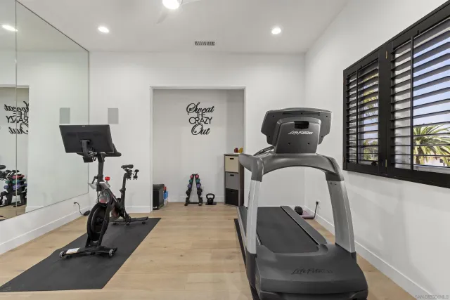 a view of a room with gym equipment