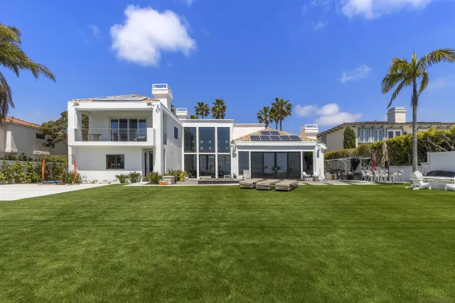 a front view of building with yard