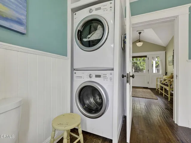 a living room with furniture and a gate