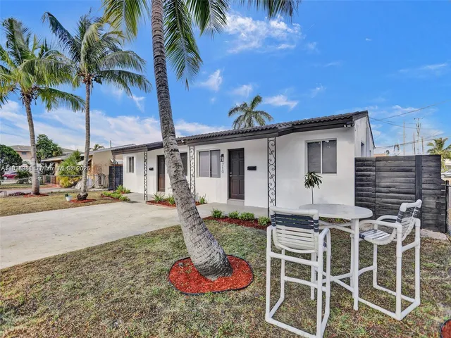 a front view of a house with a porch