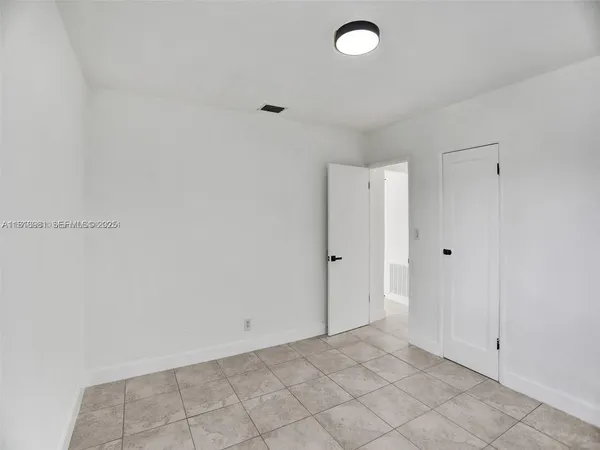 a view of a room with furniture