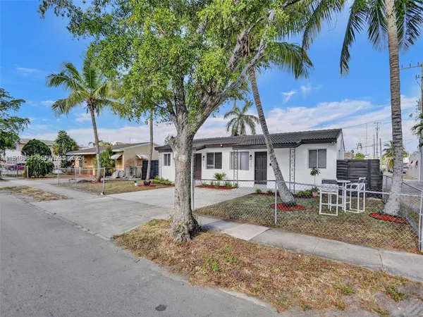 a front view of a house with a porch