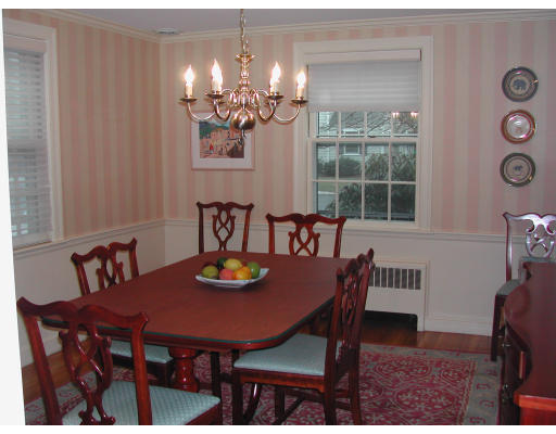 38 Northgate Road Wellesley, MA 02481 - Photo 3 of 11 a view of a dining room with furniture and chandelier