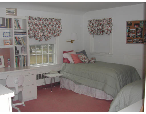 38 Northgate Road Wellesley, MA 02481 - Photo 8 of 11 a bedroom with a bed and a window