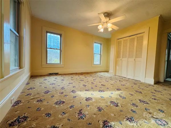 a view of a bedroom with a natural light