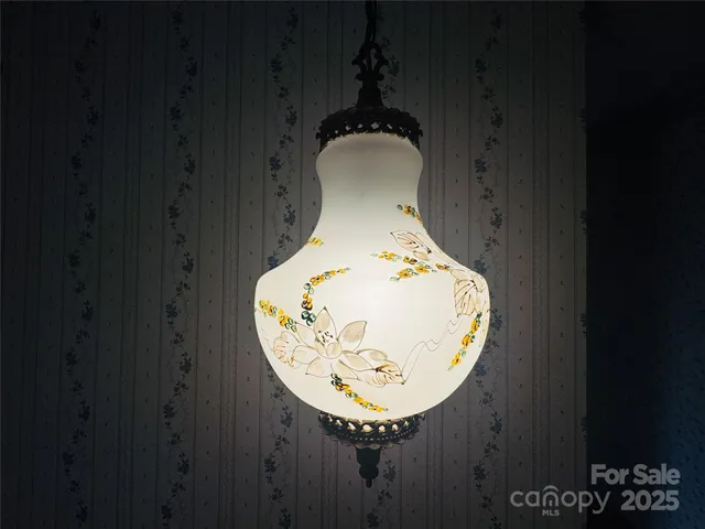 a close view of a chandelier in a bathroom