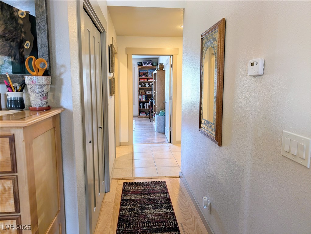 8320 Mother Lode Road Pioche, NV 89043 - Photo 31 of 46 Hallway featuring wood flooring and large closet