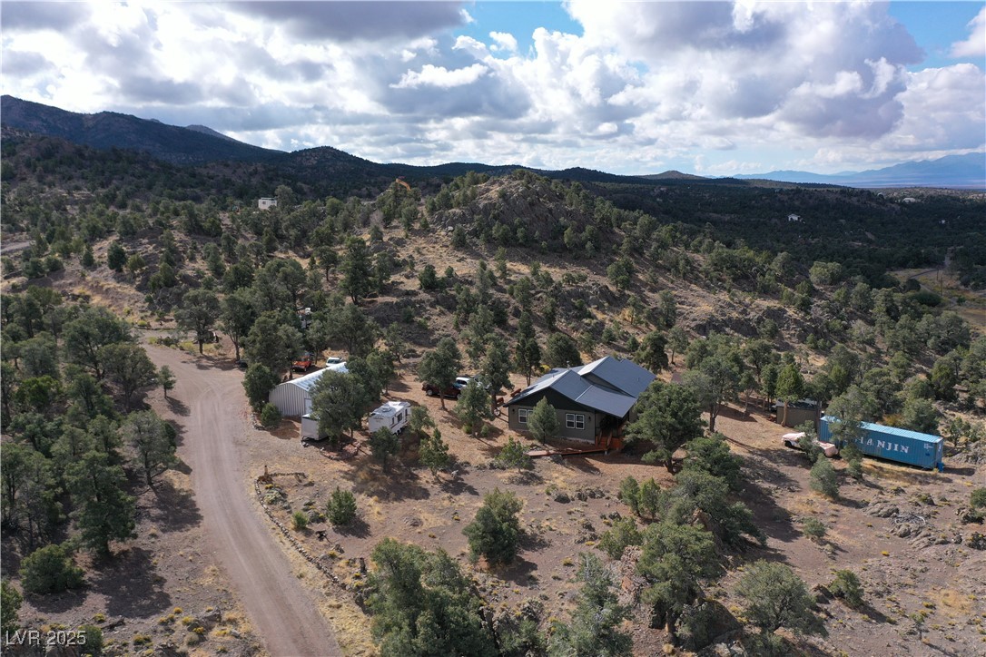 8320 Mother Lode Road Pioche, NV 89043 - Photo 41 of 46 Aerial view of property and surrounding area with mountains