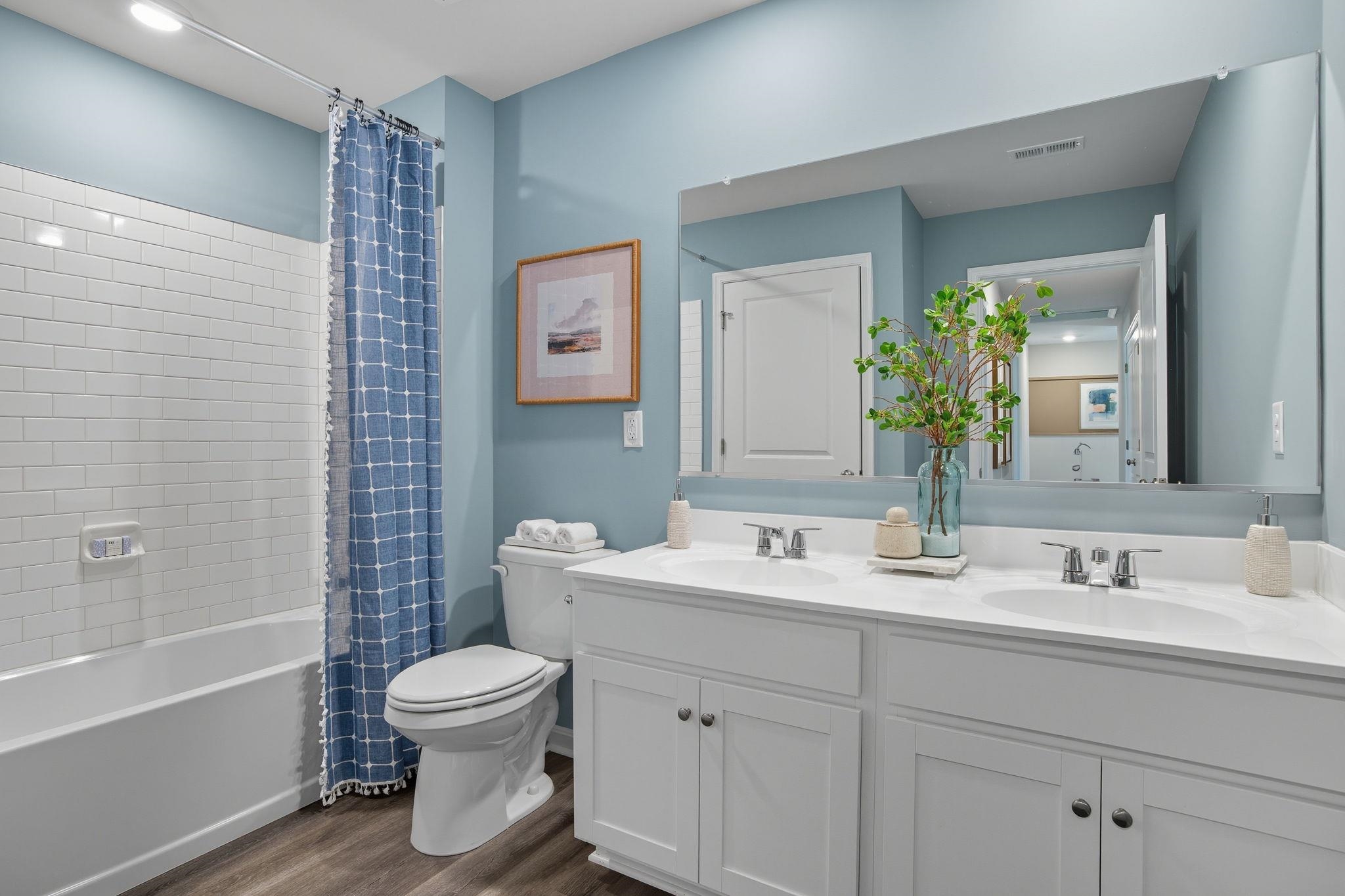 113 Meadow Ridge Way Staunton, VA 24401 - Photo 16 of 30 a bathroom with a toilet sink and mirror
