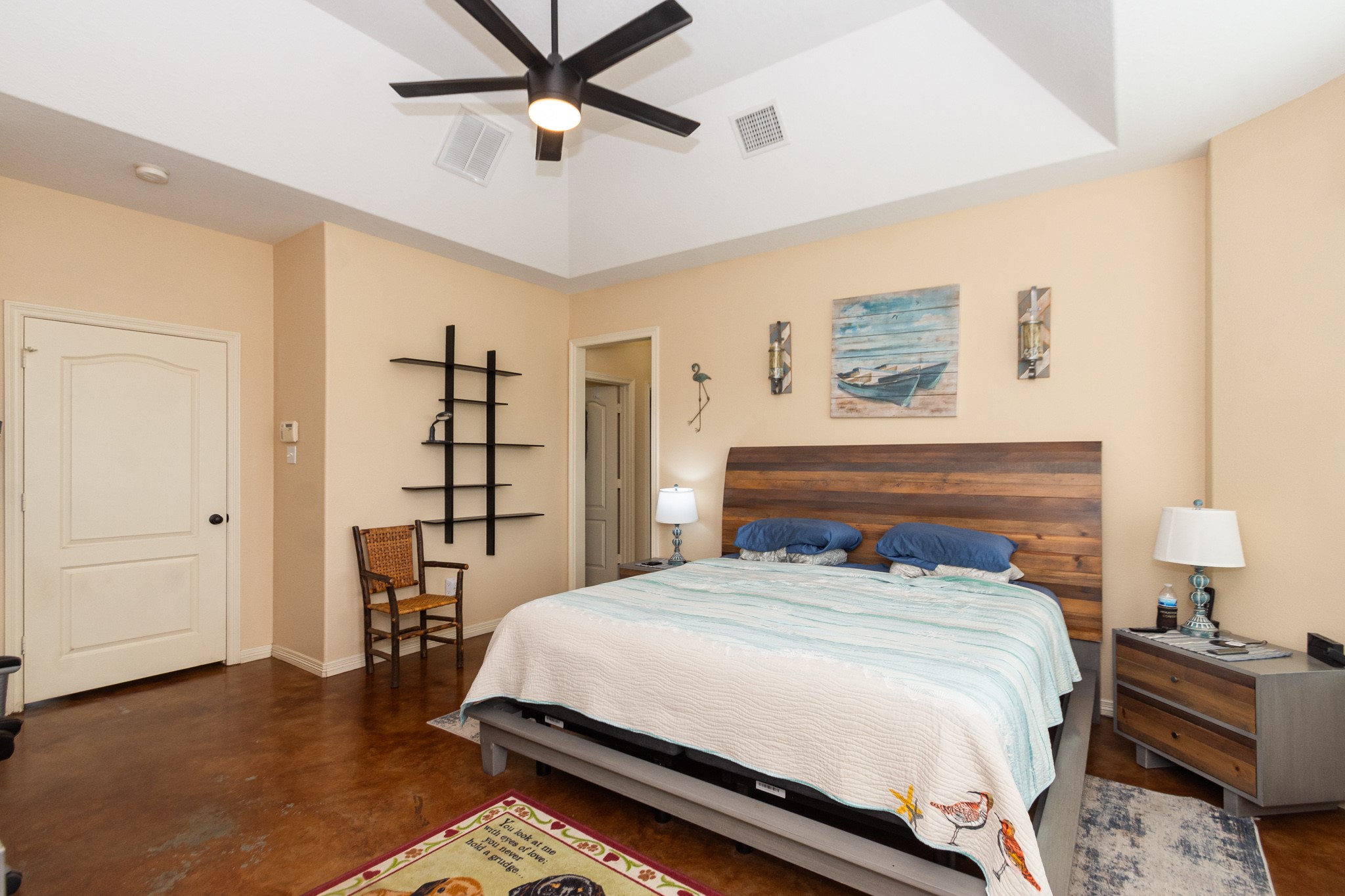 5 Shore Acres Circle Shoreacres, TX 77571 - Photo 16 of 38 a bedroom with a bed and a chandelier