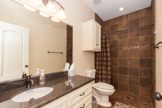 a kitchen with stainless steel appliances sink and cabinets