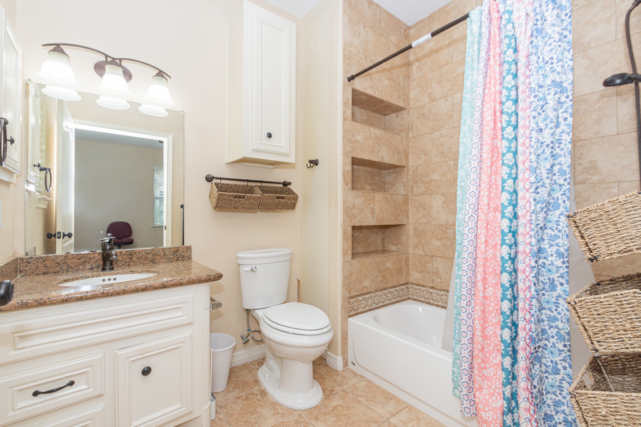 5 Shore Acres Circle Shoreacres, TX 77571 - Photo 22 of 38 a bathroom with a granite countertop sink toilet and shower
