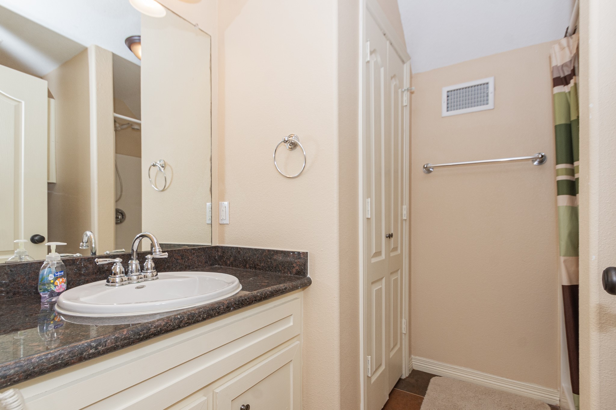 5 Shore Acres Circle Shoreacres, TX 77571 - Photo 27 of 38 a bathroom with a sink and a mirror