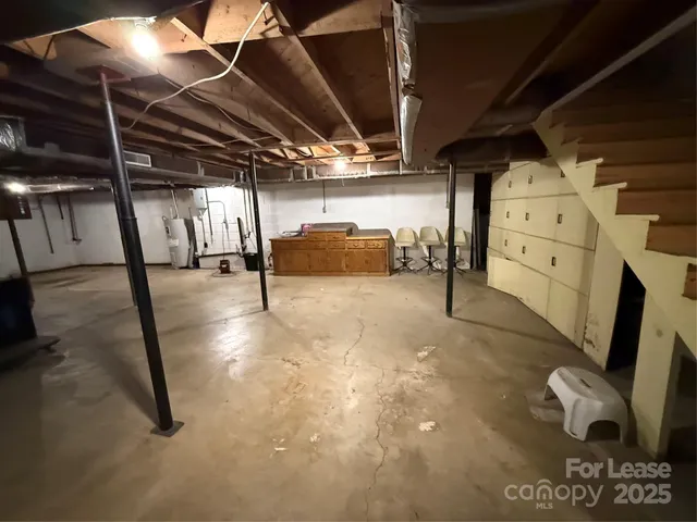 a view of a house with a yard and garage