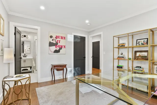 a view of a livingroom with furniture and window