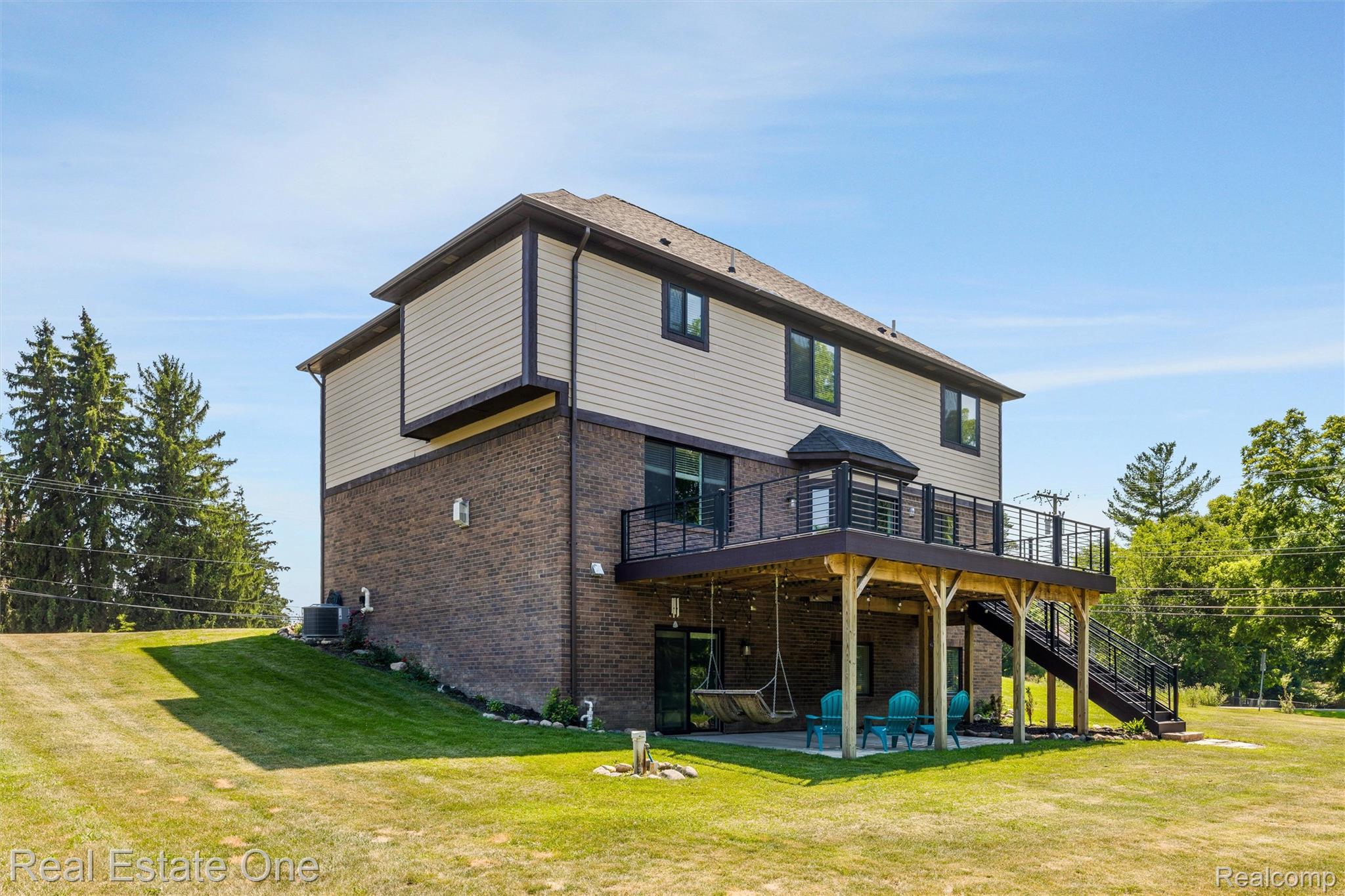 2983 28 Mile Road Washington, MI 48094 - Photo 45 of 54 Multi-level exterior featuring brick and horizontal siding