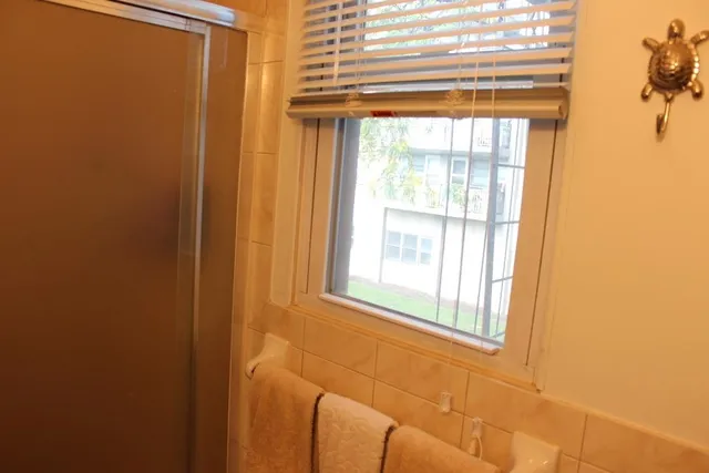 a view of a window and an empty room