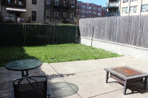 a bench sitting in front of a building