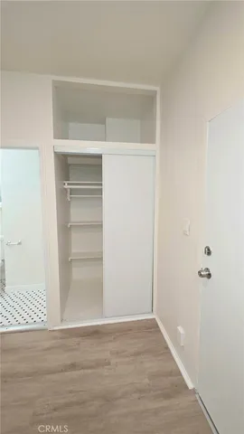 a view of an empty walk in closet