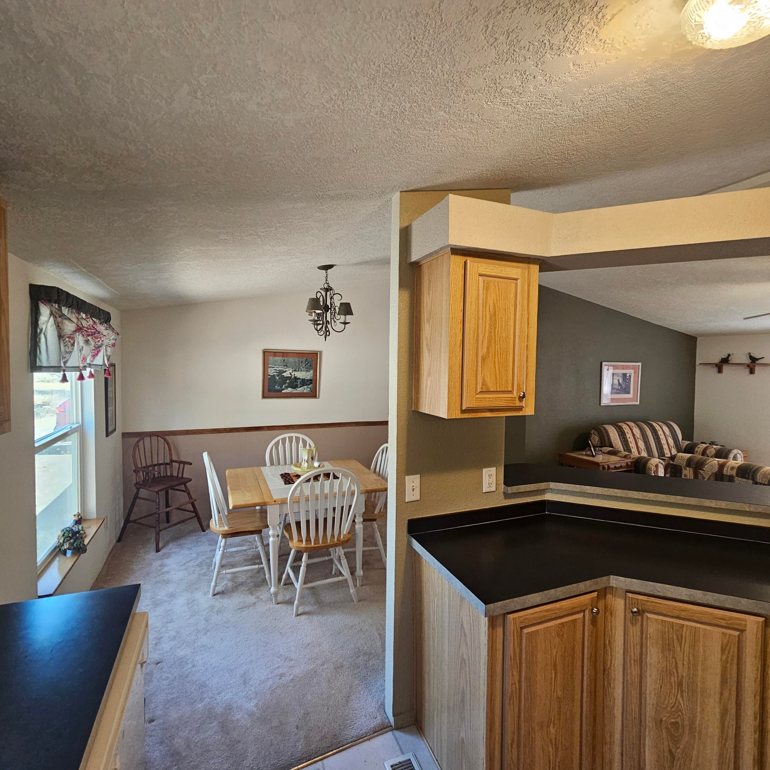 14165 Southwest Ridge Place Terrebonne, OR 97760 - Photo 9 of 23 kitchen to dining