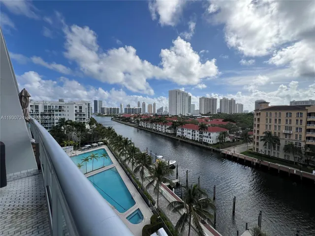 a view of a city skyline from a balcony