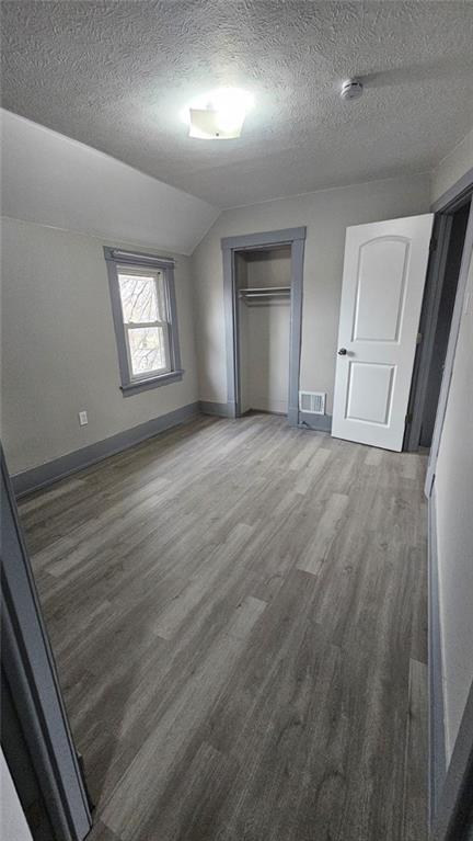238 Malleable Street Sharon, PA 16146 - Photo 11 of 14 an empty room with wooden floor and windows