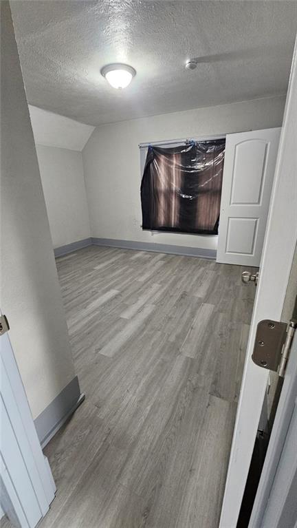 238 Malleable Street Sharon, PA 16146 - Photo 13 of 14 a view of an empty room with wooden floor