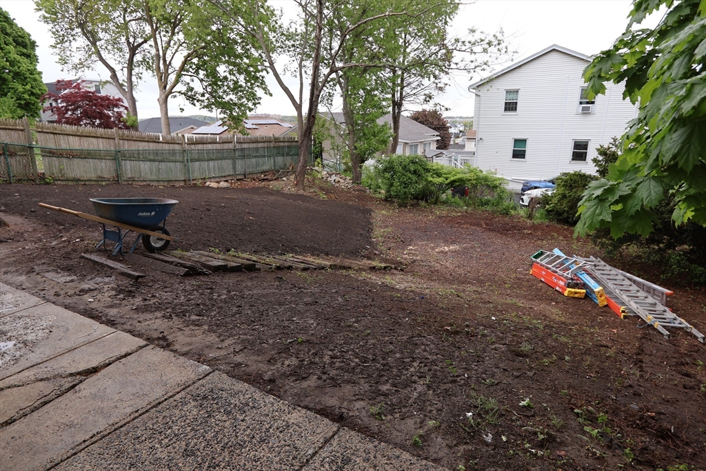 331 Proctor Avenue Revere, MA 02151 - Photo 29 of 29 a view of a house with a backyard and tree