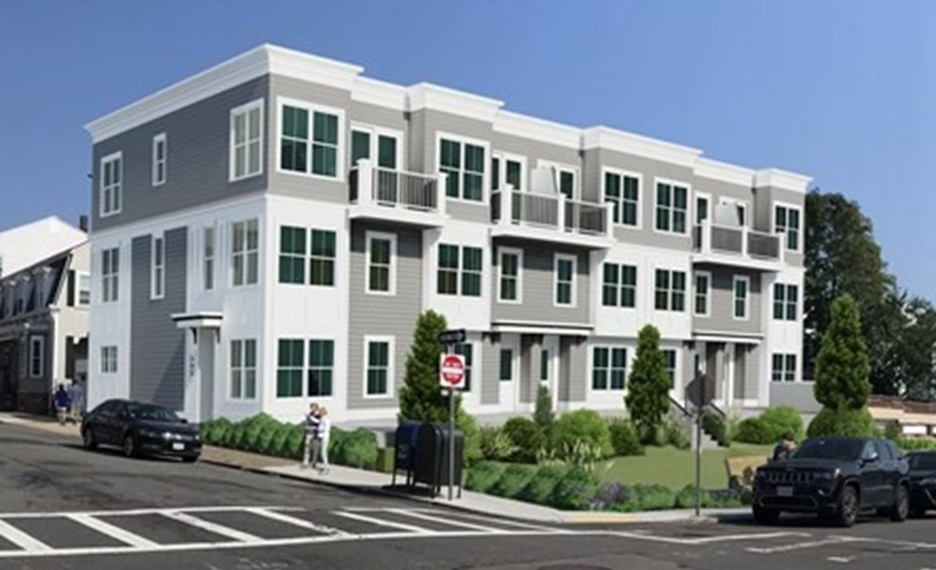 142 P Street, Unit 1 Boston, MA 02127 - Photo 1 of 6 a front view of a building with street view