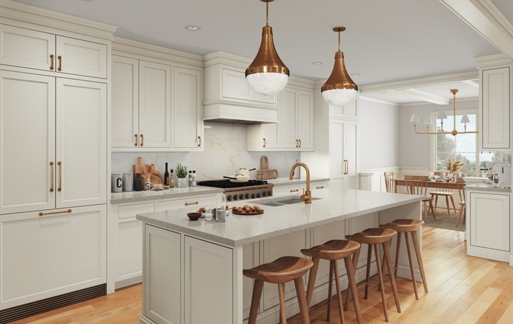 142 P Street, Unit 1 Boston, MA 02127 - Photo 4 of 6 a kitchen with stainless steel appliances a sink a stove a refrigerator dining table and chairs