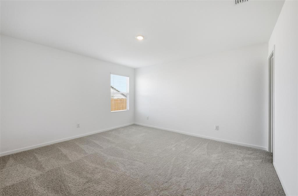 3707 Spring Run Drive Sherman, TX 75092 - Photo 10 of 18 a view of an empty room with a window