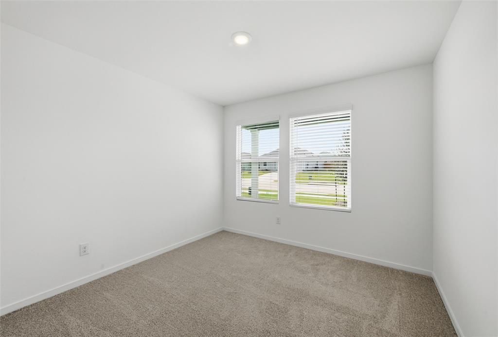3707 Spring Run Drive Sherman, TX 75092 - Photo 7 of 18 an empty room with a window