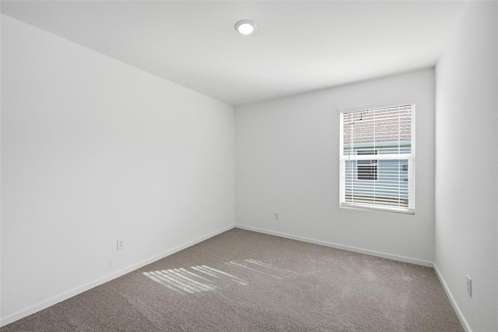 3707 Spring Run Drive Sherman, TX 75092 - Photo 8 of 18 an empty room with a window