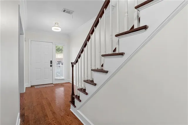 a view of entryway with wooden floor