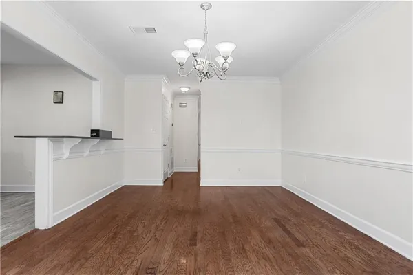 a kitchen with stainless steel appliances granite countertop a refrigerator sink and stove
