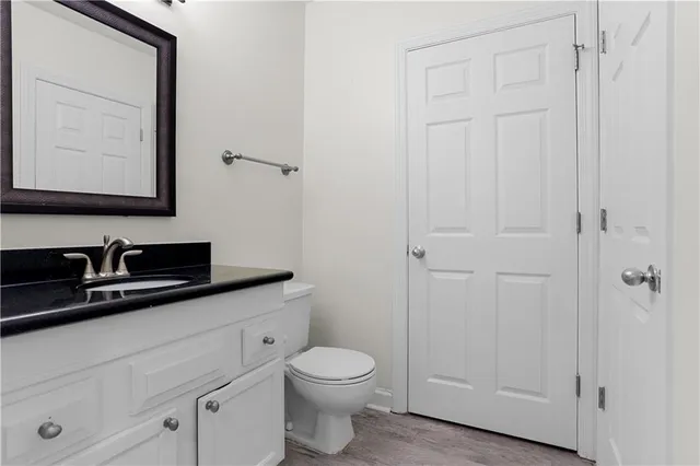 a view of a chair and table in the balcony