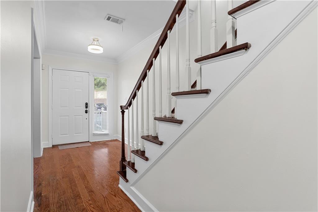 7500 Roswell Road, Unit 78 Atlanta, GA 30350 - Photo 9 of 22 a view of entryway with wooden floor