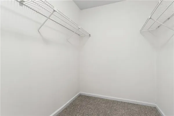 a view of a room with racks on the wall