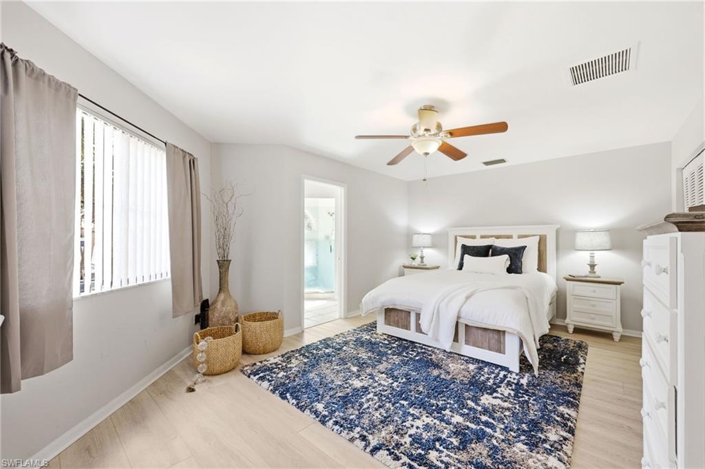 2860 Citrus Lake Drive, Unit R204 Naples, FL 34109 - Photo 18 of 38 Master Bedroom