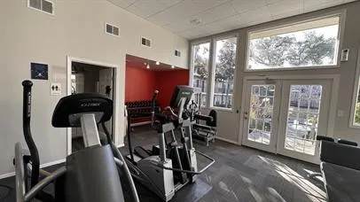 a view of a livingroom with furniture and windows