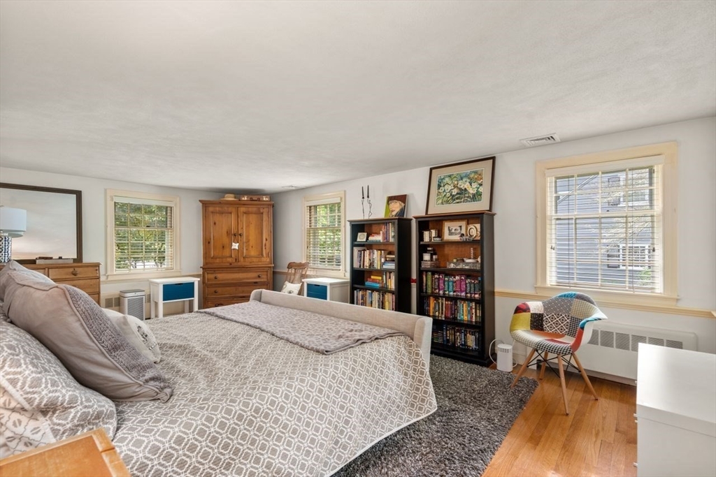11 Nantucket Road Wellesley, MA 02481 - Photo 19 of 23 a bedroom with a large bed and a large window