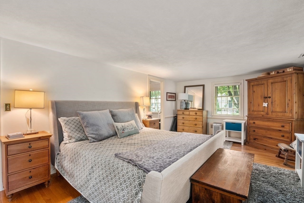 11 Nantucket Road Wellesley, MA 02481 - Photo 20 of 23 a bedroom with a large bed and a dresser