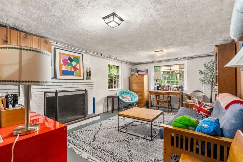 11 Nantucket Road Wellesley, MA 02481 - Photo 21 of 23 a living room with furniture a fireplace and a window