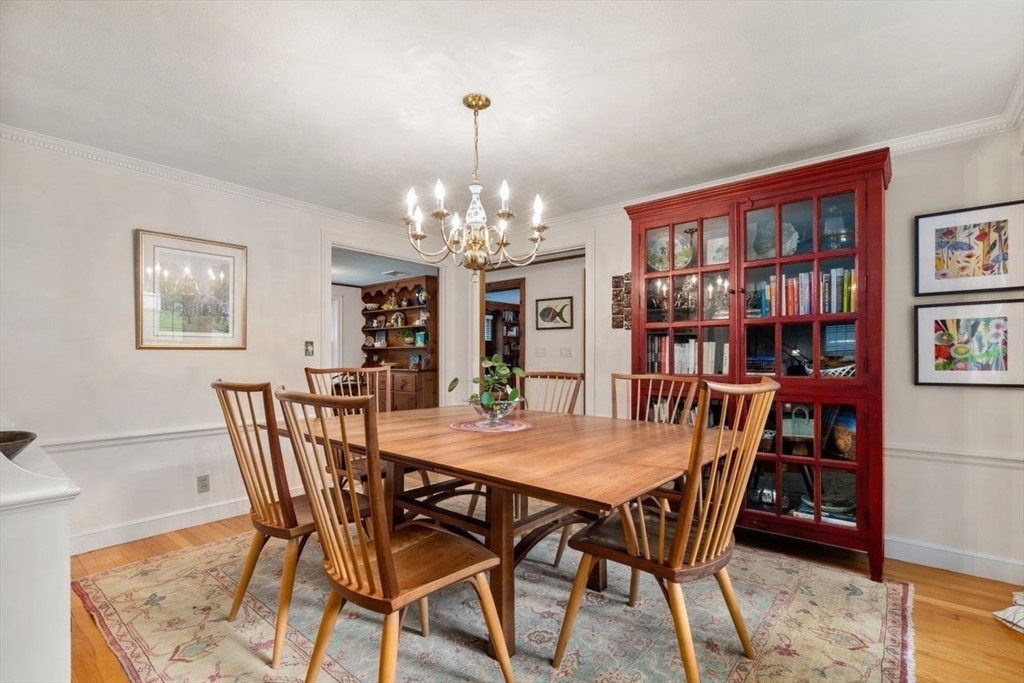 11 Nantucket Road Wellesley, MA 02481 - Photo 8 of 23 a view of a dining room with furniture and chandelier
