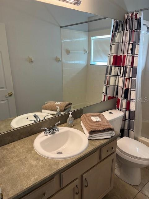 2533 Oneida Loop Kissimmee, FL 34747 - Photo 53 of 73 a bathroom with a sink a toilet and shower