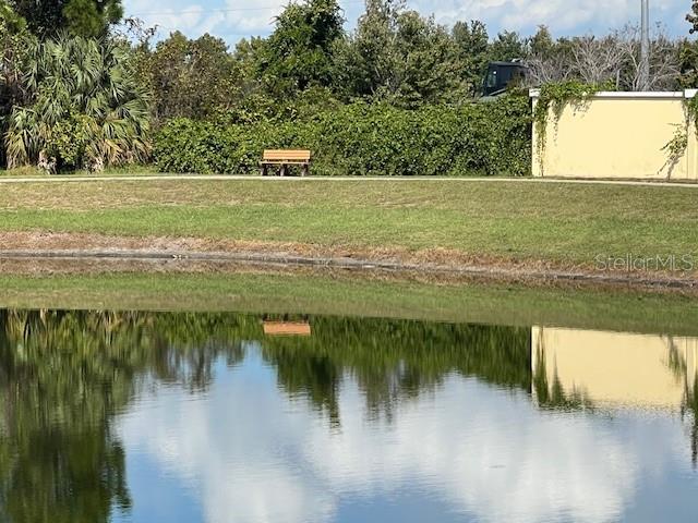 2533 Oneida Loop Kissimmee, FL 34747 - Photo 10 of 73 a view of a lake from a yard