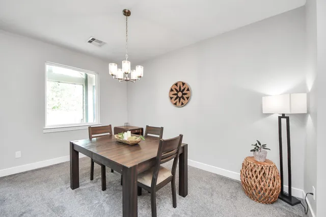 a workspace with furniture and window