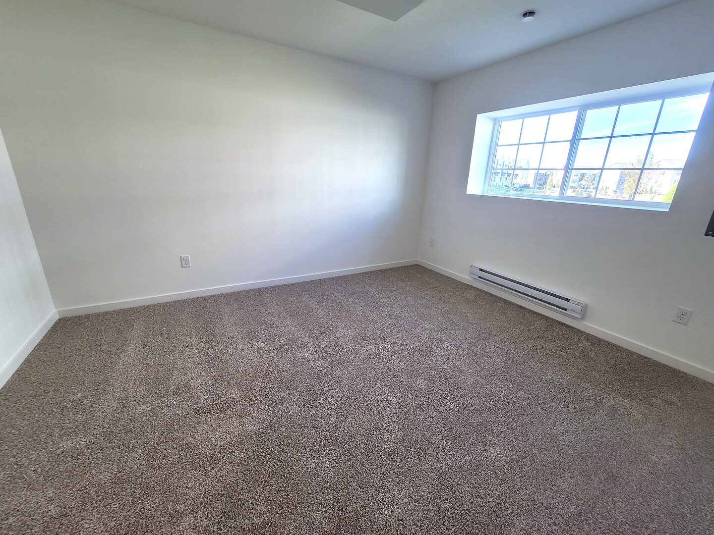 6550 Linden Trail, Unit F Wonder Lake, IL 60097 - Photo 14 of 18 an empty room with windows