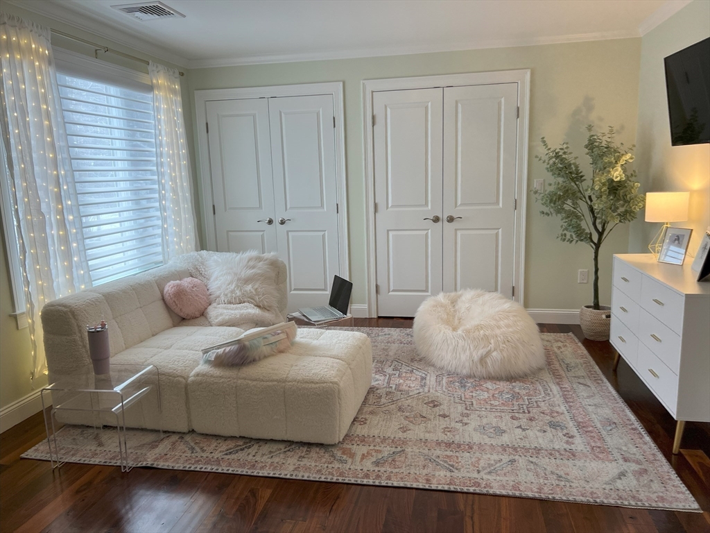 69 Narrows Road Assonet, MA 02702 - Photo 16 of 40 a living room with furniture and a flat screen tv