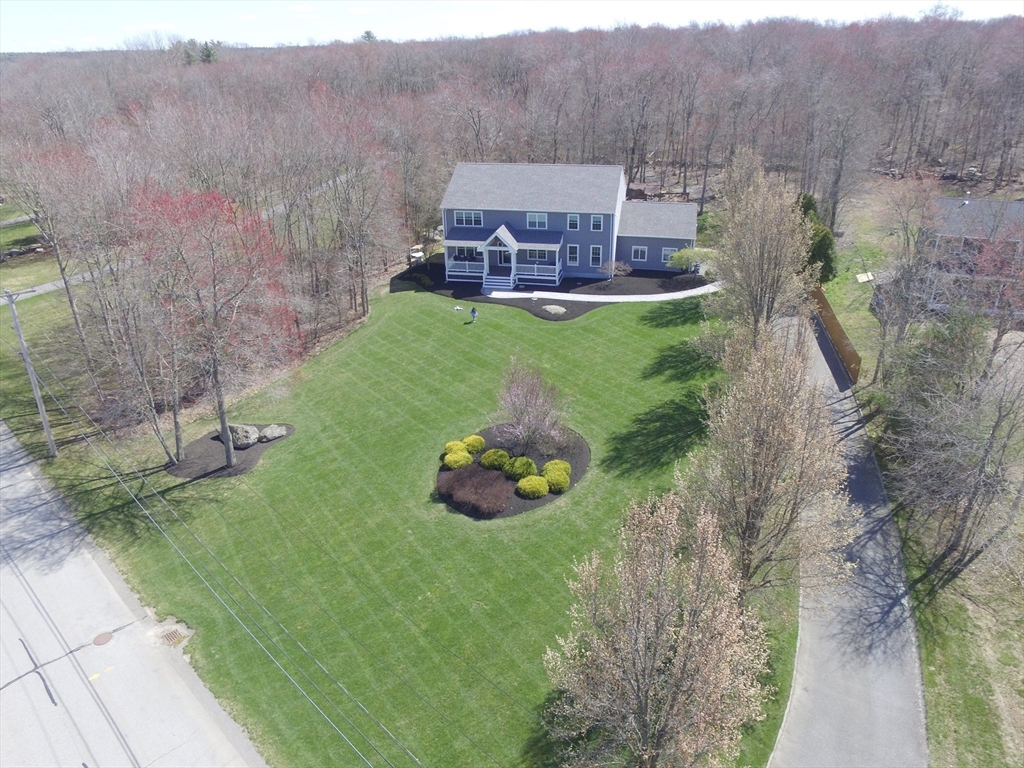 69 Narrows Road Assonet, MA 02702 - Photo 3 of 40 a aerial view of a house with garden
